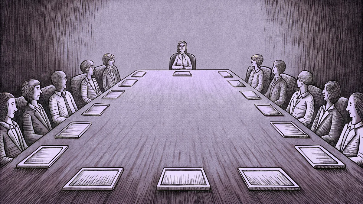 A leadership conference room shows people gathered around a long wooden table.