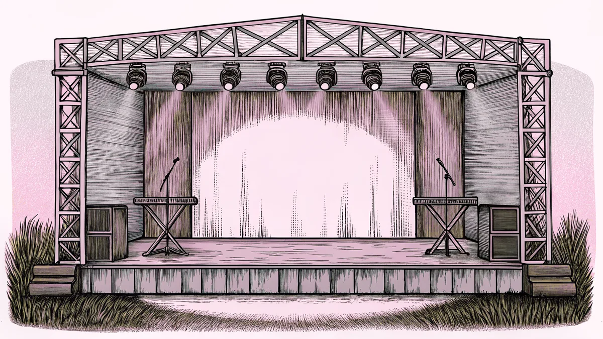 A concert stage glows with bright lights beside multiple microphones and a keyboard instrument ready for performance.