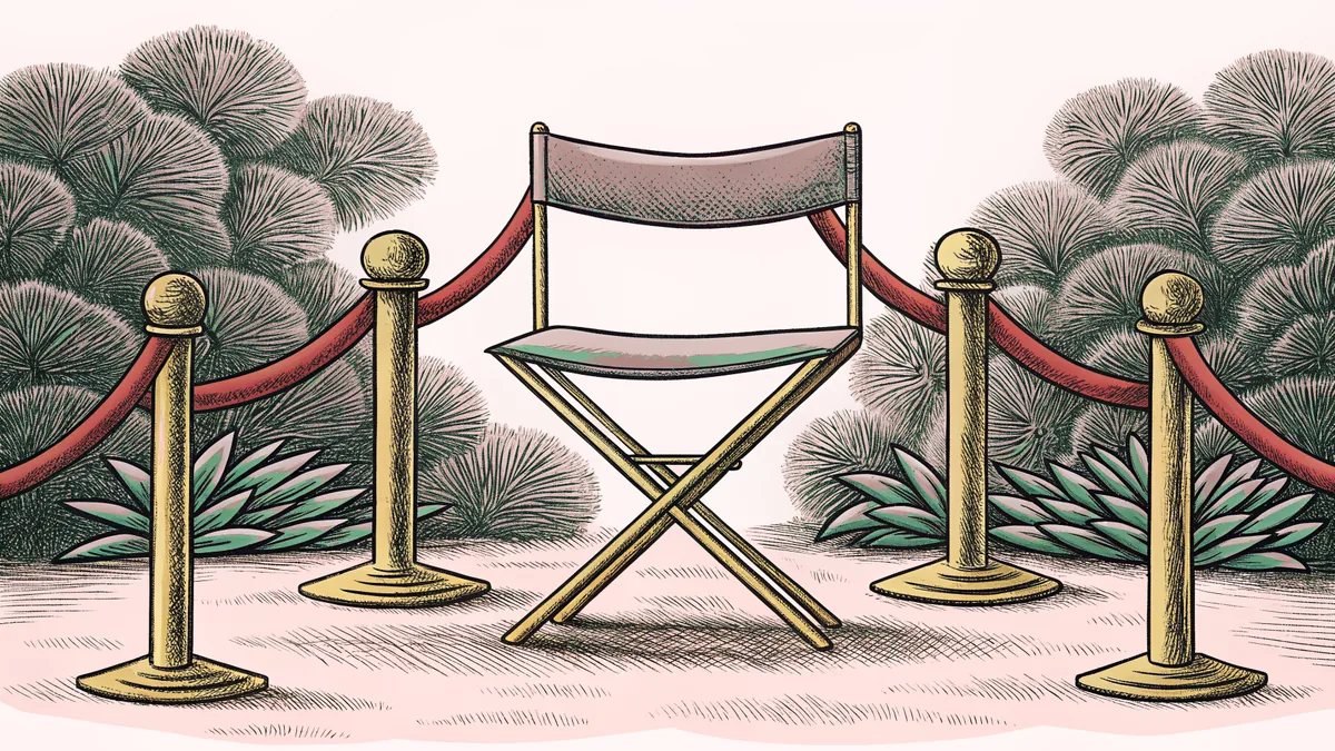 A velvet barrier rope slung between brass stanchions, beside an open director's chair with a canvas seat.