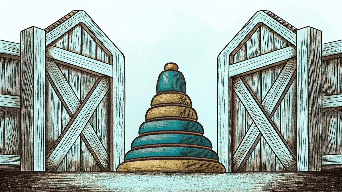 A stacking ring toy beside an open wooden crate.