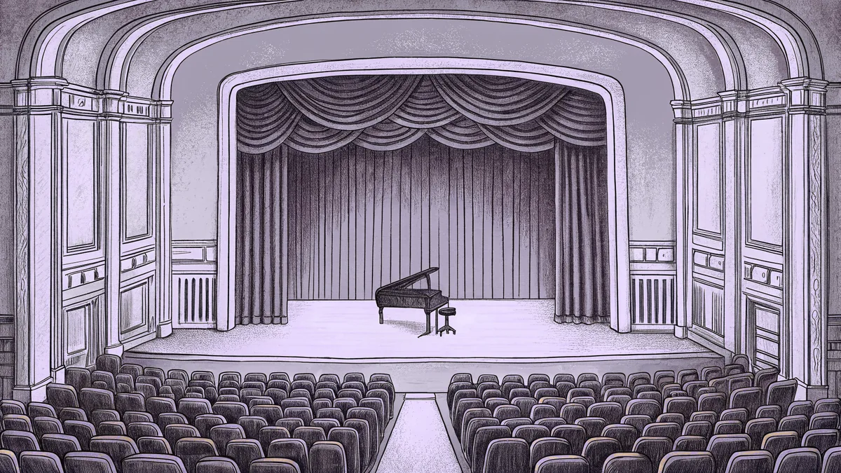 Concert grand piano with violin and trumpet on a stage.