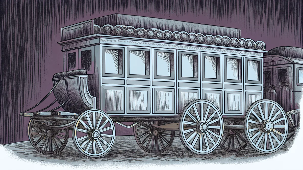 A restored Concord coach stands with period wooden carriages nearby.