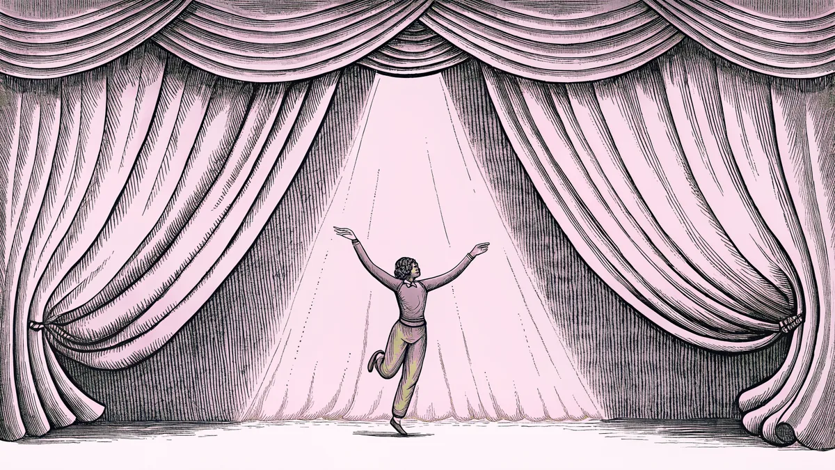 A dancer mid-leap on stage illuminated by a bright spotlight.