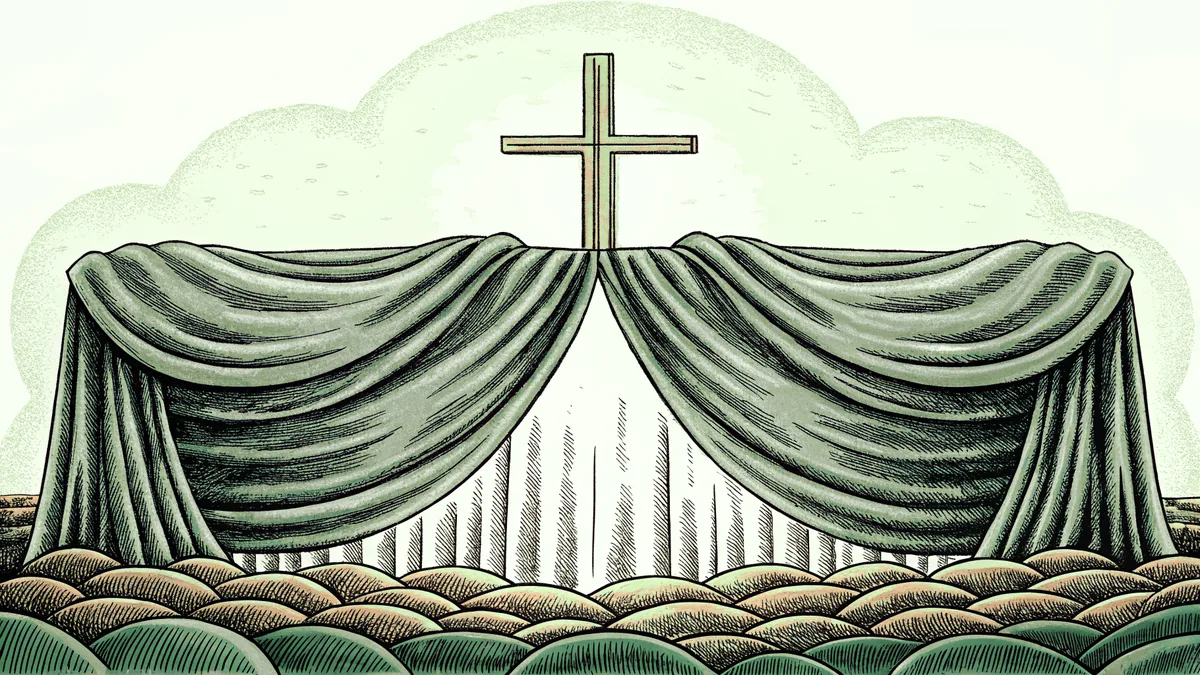 A crucifix and winding sheet displayed beneath a glowing candle against a stone background.