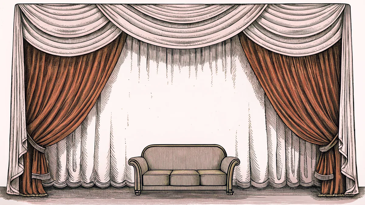 A plush velvet theatre curtain frames a silhouette of a mid-century sofa and side table in soft theatrical light.