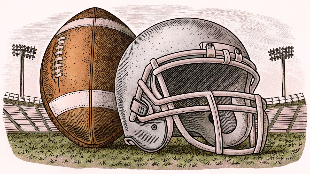 A football and helmet rest on green grass under towering stadium lights.