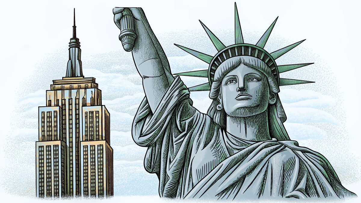 The Statue of Liberty and Empire State Building silhouetted at sunset.