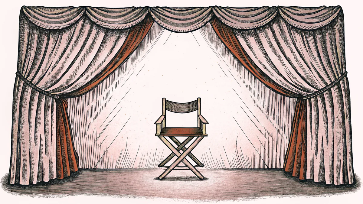 A soft theatrical spotlight illuminates a leather director's chair positioned in front of a plush velvet curtain.