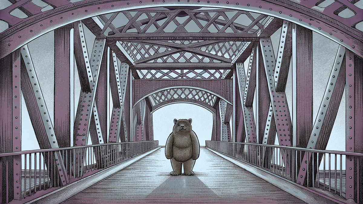 A historic arched bridge over a river with distinctive Waco architecture.