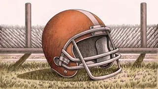 A football helmet sits on grass beside tall white goalposts with yard line markings.
