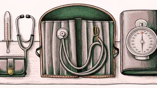 Medical instruments on a doctor's examination table.