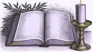 A lit candle and a small cross rest beside an open Bible with blank pages.