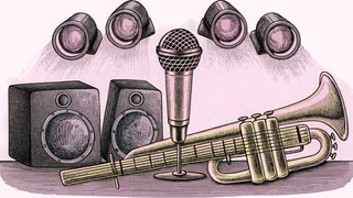 A golden microphone stands on stage beside a bass guitar and brass trumpet beneath colorful lights.