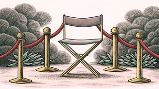 A velvet barrier rope slung between brass stanchions, beside an open director's chair with a canvas seat.