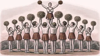 Cheerleaders in formation build a human pyramid with pompoms held high.