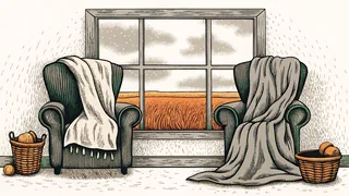A cozy fireside with wool sweaters draped nearby, drizzle outside, and harvested fields.