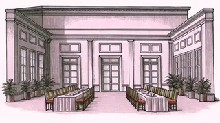 A long table is set with many different chairs beside an open door with warm light beyond it.