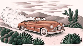 A classic convertible races across a dusty desert road with distant mountain peaks.