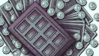 Calculator and blank financial ledger surrounded by various coins and paper currency on a work desk.