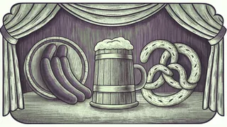 Beer stein with bratwurst sausages and soft pretzels at Oktoberfest