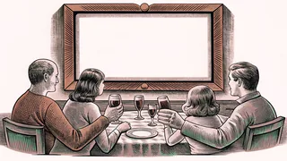 Around a dining table, a family gathers to raise glasses