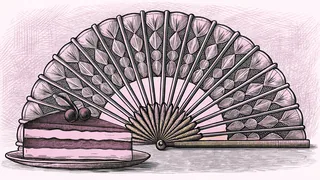 A slice of cheesecake topped with cherries, beside a pleated paper fan.
