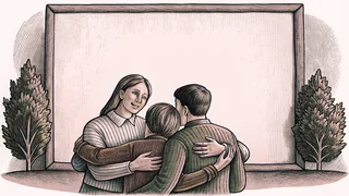A family embraces in a moment of warmth and grateful appreciation.