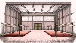 A balance beam stands beside parallel bars with a thick padded mat underneath in a bright, well-lit gymnastics gym.
