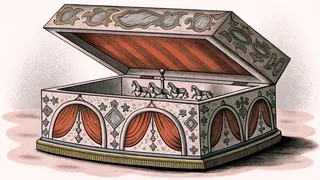 An intricately detailed music box with carousel horses and glowing crystal elements in theatrical lighting.