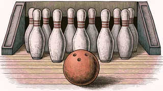 A polished bowling ball rests near white pins on a wooden lane beside a scoreboard.