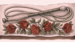 A leather riding crop beside a garland of roses.