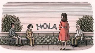 Two women embracing warmly on a sunny Spanish street corner.