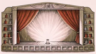 A spotlight illuminates a snow globe and paint pots on a theatrical shelf.
