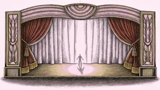 A performance stage with a solo dancer spotlit against dramatic lighting.
