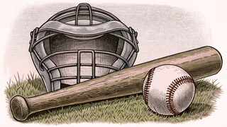 A wooden baseball bat lies beside a white baseball with a catcher's mask resting on green grass.