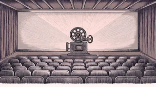 Filmmaking equipment arranged on a shelf: a projector lens with film canisters and cinema seat rows in the background.