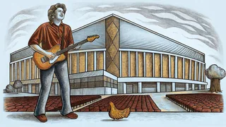 A guitarist performs at the Grand Ole Opry, Nashville's historic music hall.