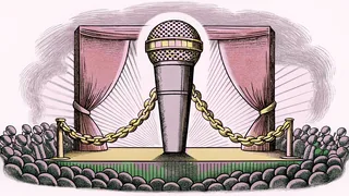 A microphone and gold chain jewelry rest on a concert stage beneath vibrant LED stage lighting.