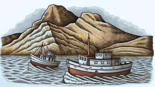 Fishing boats bring in tuna near Long Bay's scenic mountain backdrop.
