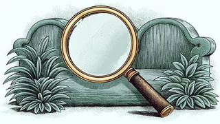 A magnifying glass rests on a blank card next to a wooden pencil cup.