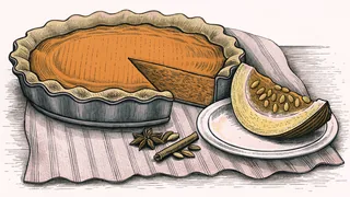 A freshly baked pumpkin pie cooling beside whole pumpkins and autumn spices.