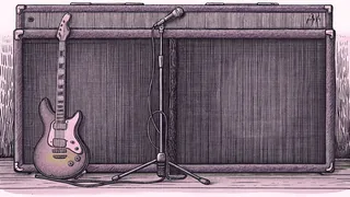 An electric guitar rests against an amplifier under concert stage lighting.