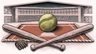 A yellow softball and bat rest on the infield dirt with a leather mitt nearby.