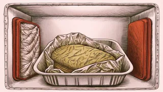 A stacked turkey sandwich dripping with gravy waits beside foil-wrapped containers.