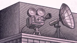 A studio camera and on-air lamp rest beside a satellite dish on a rooftop.