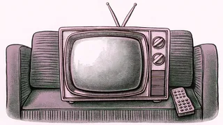 A boxy television set with rabbit-ear antennae sits beside a remote control on a sofa.