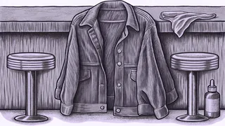 A denim jacket hangs over a diner stool beside a closed switchblade and a bottle of hair grease.