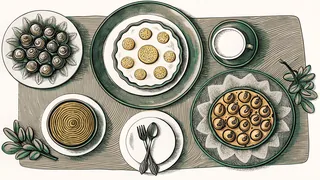 Classic French dishes arranged on fine tableware.