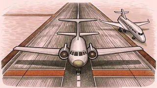 A large passenger jet takes off from a runway beside a smaller private airplane on the tarmac.