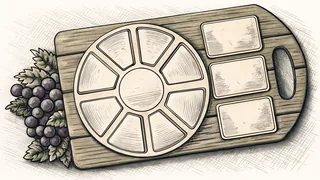 Various aged cheeses and grapes artfully arranged on a rustic wooden board.